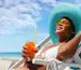 Woman sunbathing in the beach